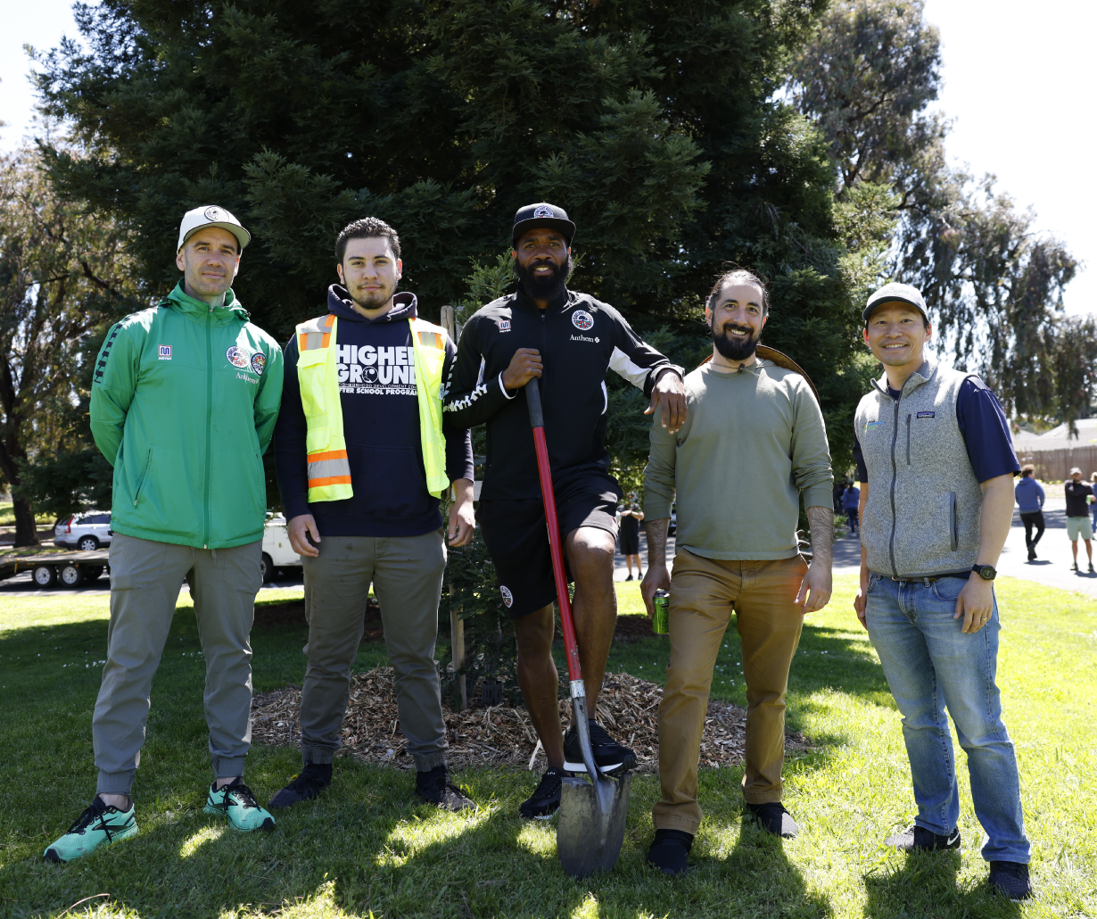 Ava staff and sponsorship partners planting a tree