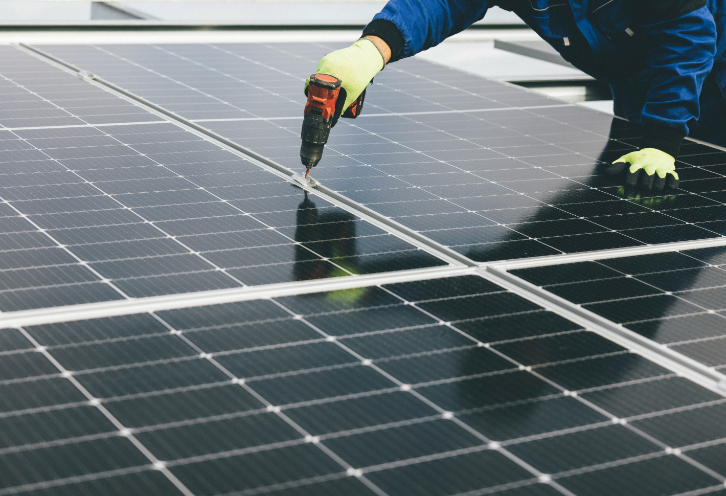 person installing solar panel