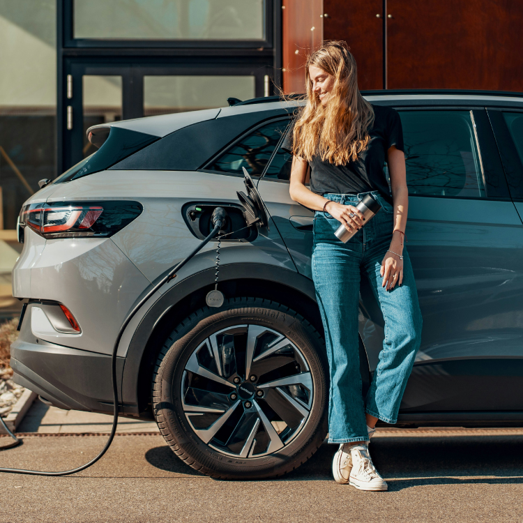 woman with electric vehicle