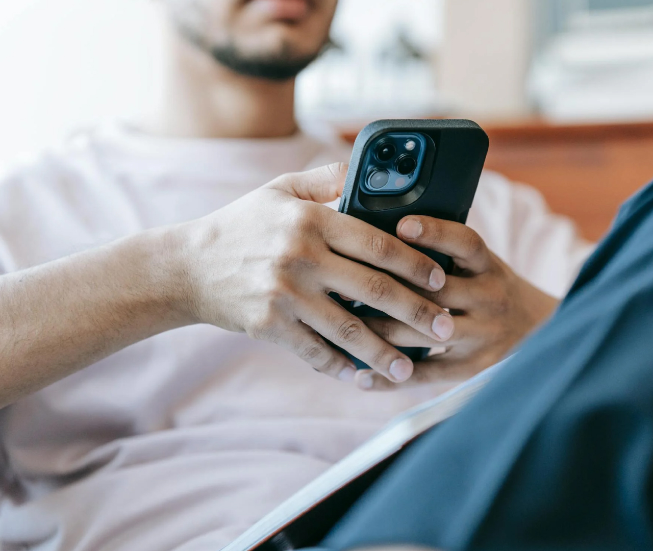 Man looking at smartphone