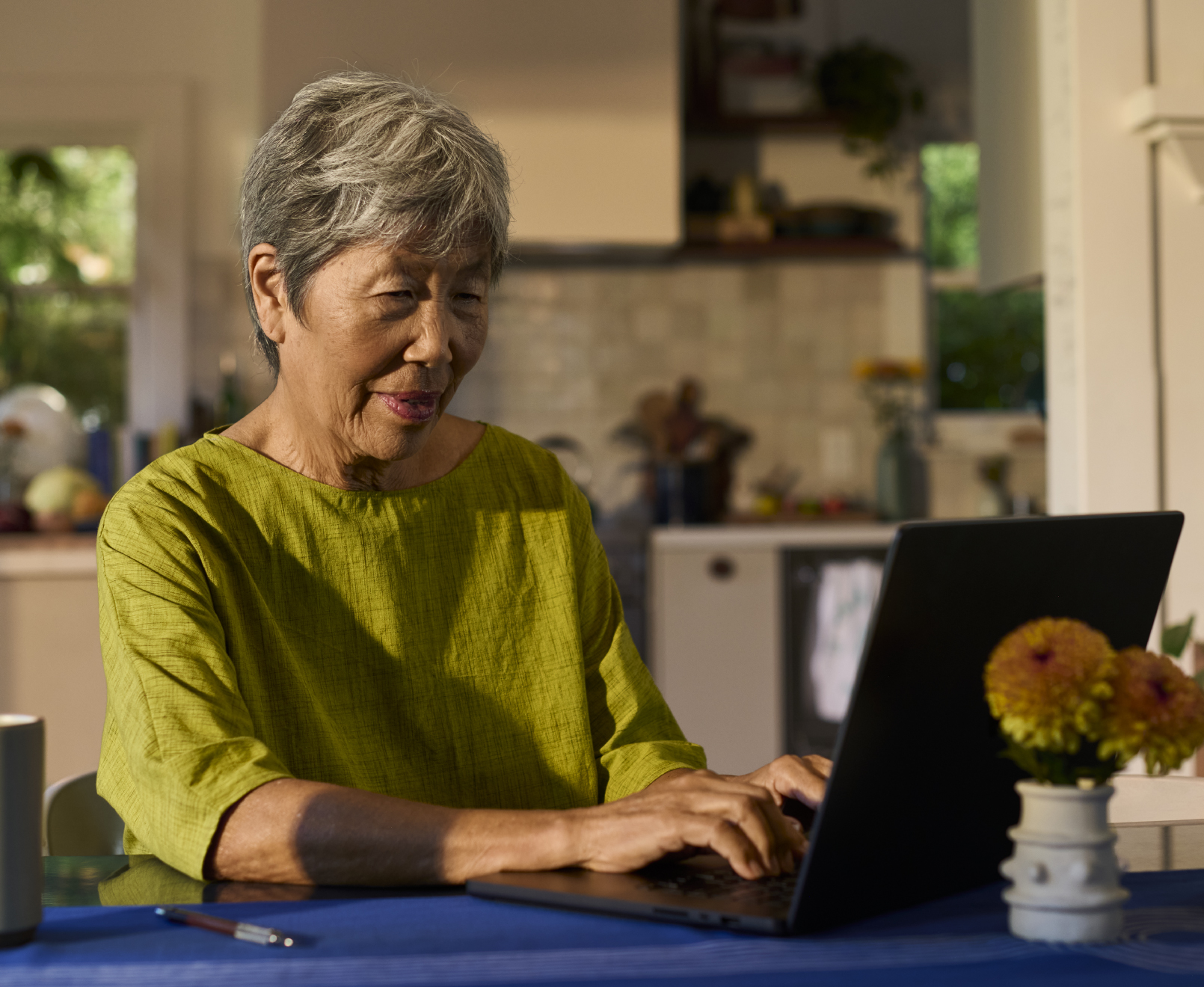 Woman looking at laptop