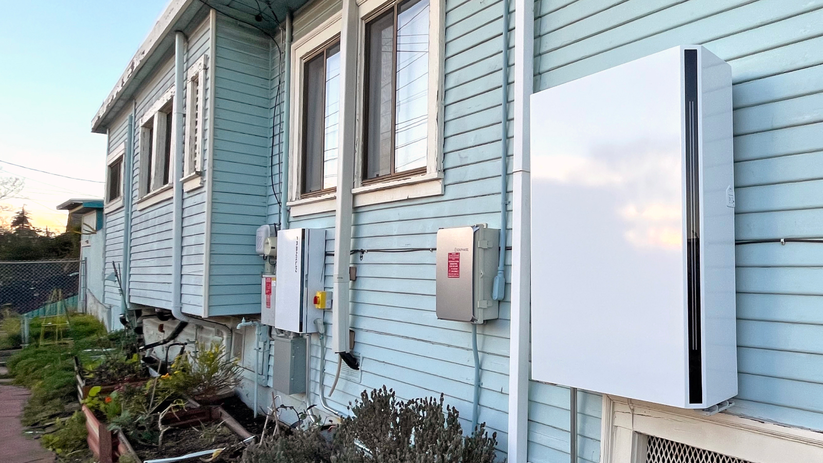 Solar-Connected Battery System Installed On Exterior Of House