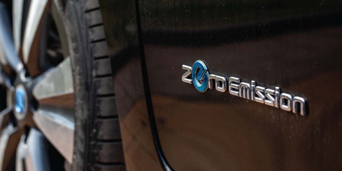 Close-Up Of A Battery Electric Vehicle With The Words &Quot;Zero Emissions&Quot; On The Side